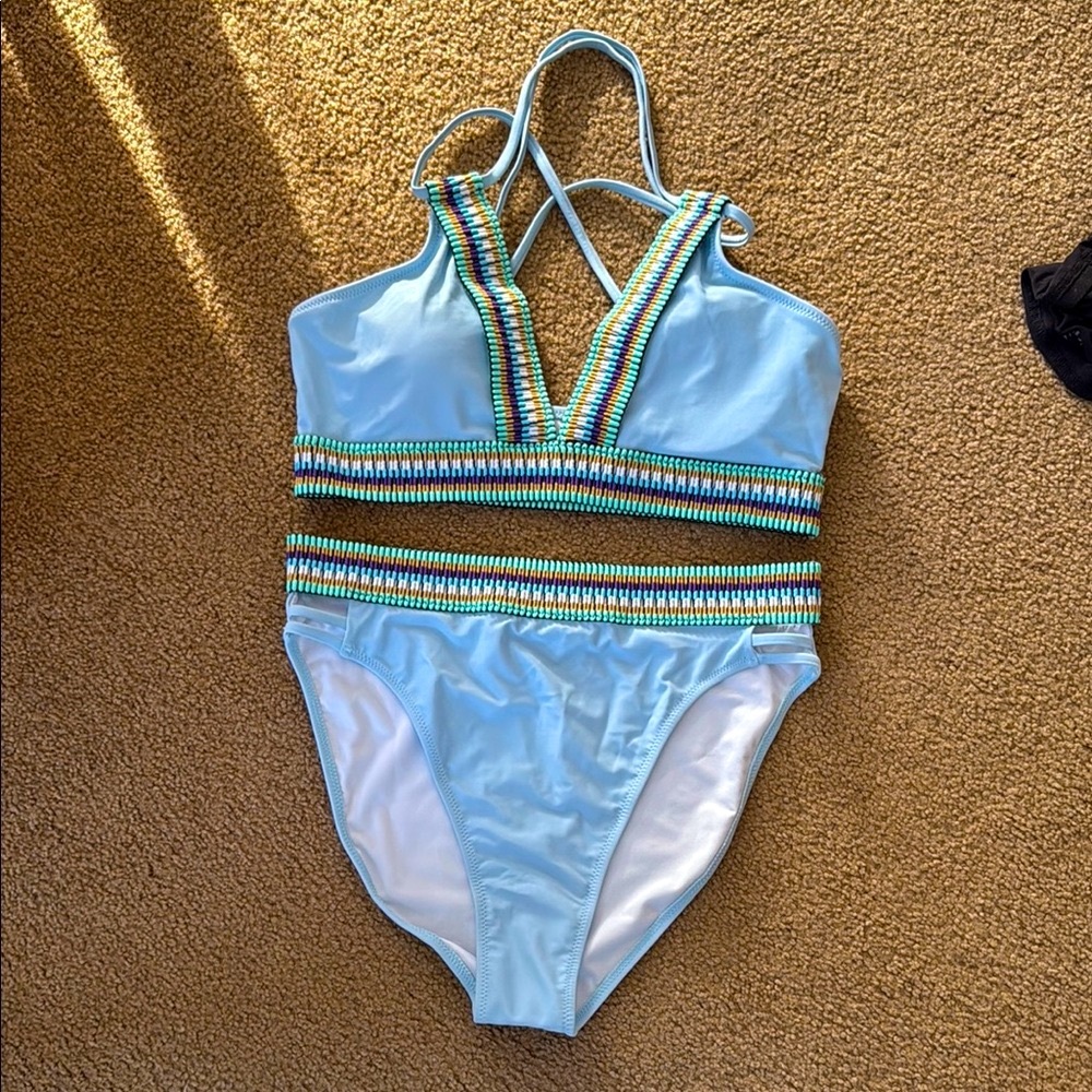 Light Blue One-Piece Swimsuit with Multicolor Stripes